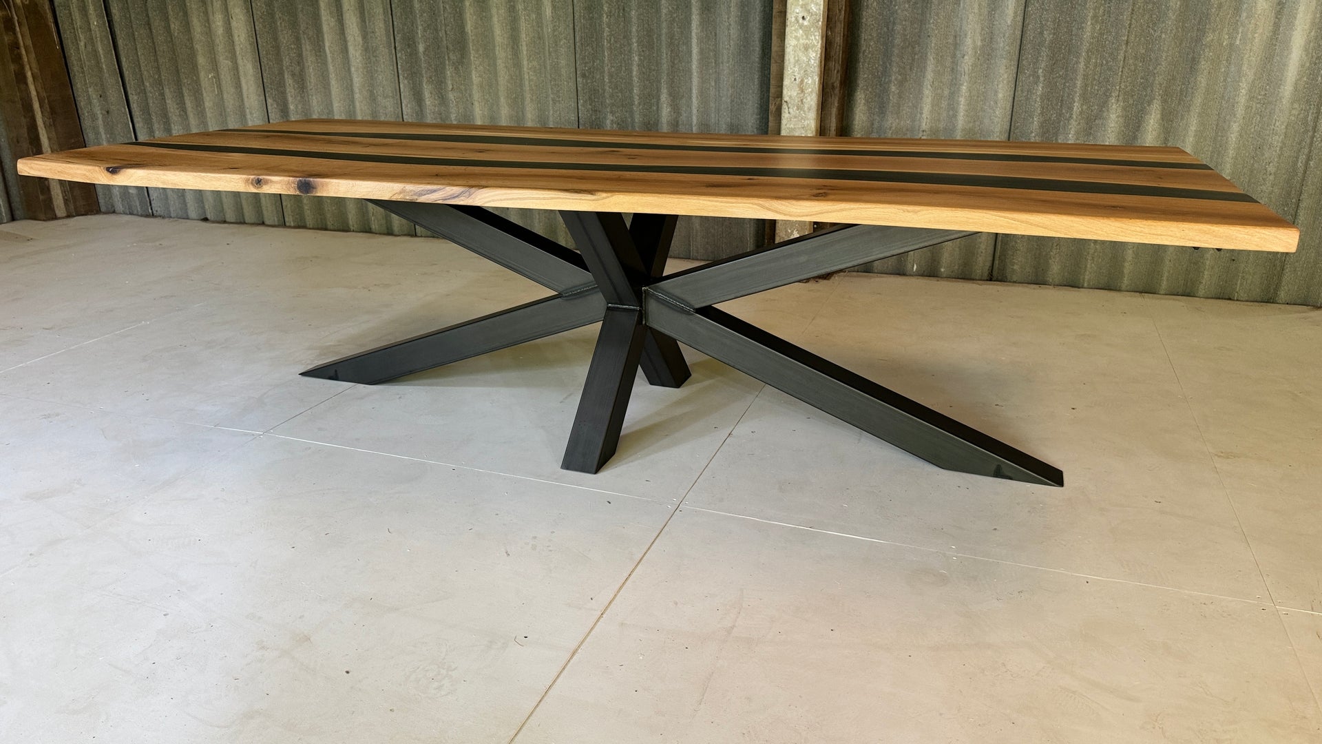 The Oak River Metal Spider 10 Seater Table